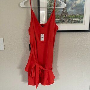 Orange Asymmetrical Wrap Ruffled Romper